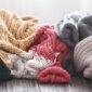 stack of colorful knitted wool blankets on wood 2026 03 24 07 42 38 utc 85x85
